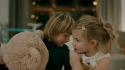 Kids with Teddy bears on christmas eve Stock Footage