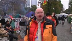 Protesters camping near ECB comment on Greek debt deal News Clip