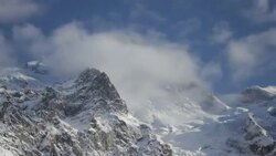 Timelapse of snow covered mountains. - Time-Lapse Stock Footage