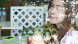 Young woman sitting for drink beverages Stock Footage