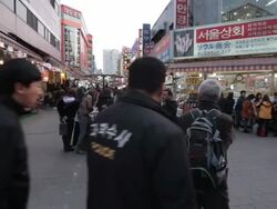 MS DS People roaming in Myeongdong Shopping area / Seoul, South Korea Stock Footage