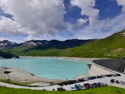 snow-capped mountains and reservoir in Sion Stock Footage