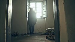 Despaired woman trapped in abandoned house Stock Footage