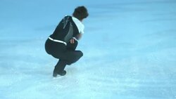 SLO MO TS Male figure skater performing combination of spins Stock Footage