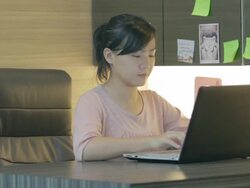 woman Typing at Keyboard,Dolly shot Stock Footage
