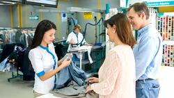 Couple taking clothes to the laundry service Stock Footage
