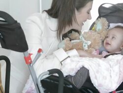 Caucasian mother looking at baby in carriage Stock Footage