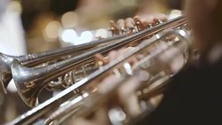 Musician playing French horn during concert Stock Footage