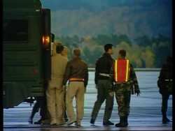 US soldiers injured in helicopter attack arrive at air base News Clip