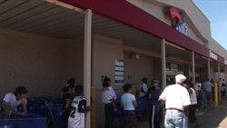 People wait in line at Sam's Club for supplies, Hurricane Katrina Stock Footage
