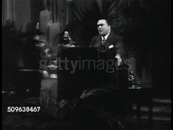 1941: FBI NATIONAL POLICE ACADEMY: FBI Director J. Edgar Hoover behind podium on stage SOT saying law enforcement first line of defense, worried about Communist & Pseudo-Liberals, seek to weaken law enforcement, will meet these challenges. Instructional Video