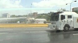 CLEAN : Police breaks up opposition protest with tear gas News Clip