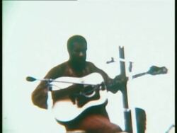 1969 MONTAGE MS ZO Richie Havens performing onstage at Woodstock music festival/ Bethel, New York, USA Stock Footage