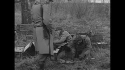 US soldiers assemble anti-tank mines in Belgium during World War II News Clip
