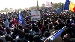 CLEAN : Tens of thousands rally in Chad to support army move News Clip