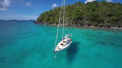 aerial video of family hanging out on a sailboat  anchored in St.John, US Virgin Islands(6) Stock Footage