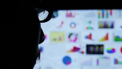 Businessman look graph in laptop in the dark Stock Footage