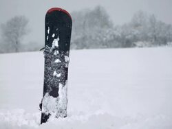 HD Super Slow-Mo: Snowboard Stuck In The Snow Stock Footage