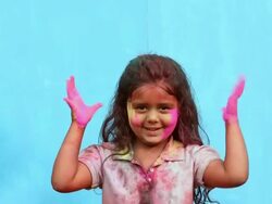 Portrait of a girl celebrating holi festival Stock Footage