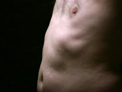 (HD1080i) Male Body Issues: Torso, Stomach, Ribs, Chest in Light Stock Footage