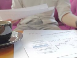 Businessman looking at financial documents,Dolly Shot Stock Footage