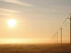 High-voltage power line at dawn Stock Footage