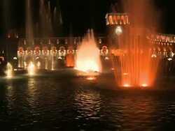 MS PAN View of Crowd looking fountain at night, Yerevan / Armenia Stock Footage
