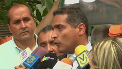 Supporters of jailed Venezuelan opposition leader Leopoldo Lopez gathered in Caracas on Tuesday to protest outside the court where he was appearing in a new trial hearing relating to violence in the capital at the beginning of the year. News Clip