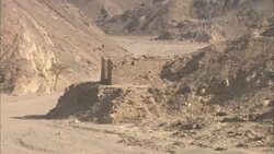 A wadi bends around ruins at the ancient emerald mining town of Sikait in the Egyptian Eastern Desert. Stock Footage