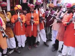 MS POV Shot of Group of local Indian musicians playing in local market AUDIO / Pushkar, Rajasthan, India  Stock Footage