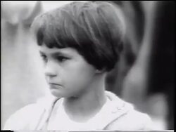 B/W 1961 close up woman talking to crying girl outdoors / West Berlin, Germany / Cold War / newsreel Stock Footage