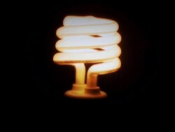 Save energy Bulb turning on Stock Footage