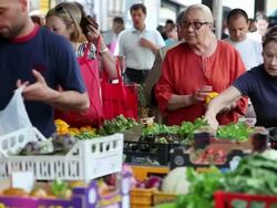MS People purchasing vegetables at outdoor market place  / Florence, Italy Stock Footage