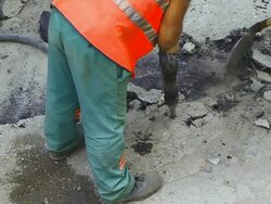 Road Worker with Jackhammer Stock Footage
