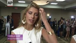 Miss USA on hosting this year, Miss France on terrorism in her country, and Miss Indonesia's color-changing gown. (Jan. 21) News Clip