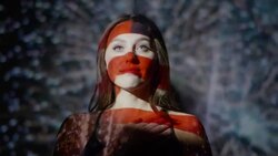 Close up slow motion shot of American flag projections on face of woman / Cedar Hills, Utah, United States Stock Footage