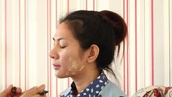 Make-up on woman face Stock Footage