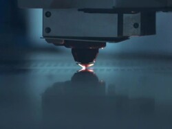 Slow motion close up of laser cutter as it glides across sheet of metal. Stock Footage