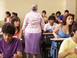 College student cheating in a exam Stock Footage