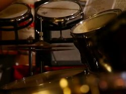 Mid shot of drummers hands as he bangs the drum. Stock Footage