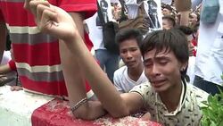 CLEAN : Myanmars Suu Kyi met by frenzied fans on visit to Thailand News Clip