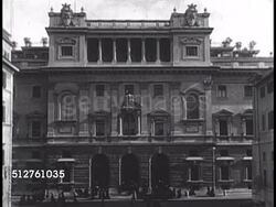 1940: PONTIFICAL GREGORIAN UNIVERSITY: VS EXT Building, sign 'Pontificia Universita Gregoriana' near roof, Seminary students leaving building. Instructional Video