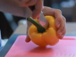 chopped bell pepper on a cutting board Stock Footage