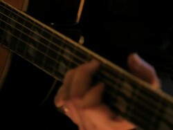 C/U from guitar player to vintage recorder Stock Footage