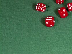 MS SLO MO View of red Dice falling into Water / Vieux pont en auge, Normandy, France Stock Footage