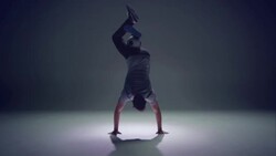 young male soccer freestyler is doing a handstand. Stock Footage