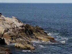 WS  Ocean waves gently crashing on rocks / Portland, ME, United States Stock Footage