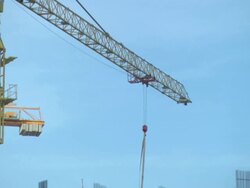WS TD Crane and construction workers on scaffolding / Dubai, UAE Stock Footage