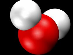 Animation of gyrating water molecule: Computer graphics space-filling model in which oxygen is shown in red, and the 2 hydrogen atoms in white Stock Footage