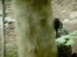 Paintball Players Capturing The Flag Stock Footage